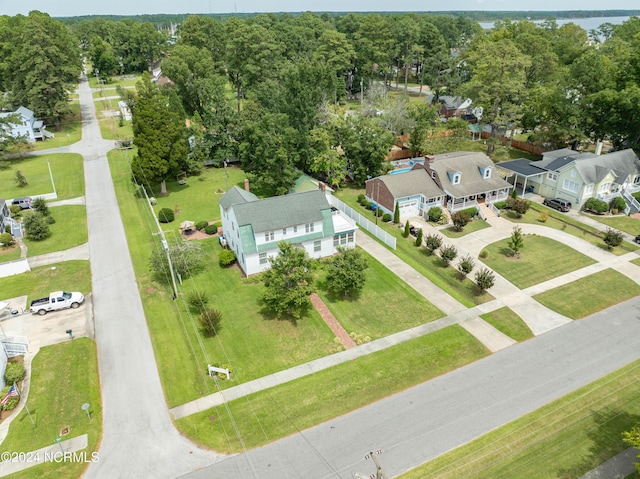 birds eye view of property with a residential view