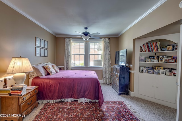 bedroom with a ceiling fan, light colored carpet, crown molding, and baseboards