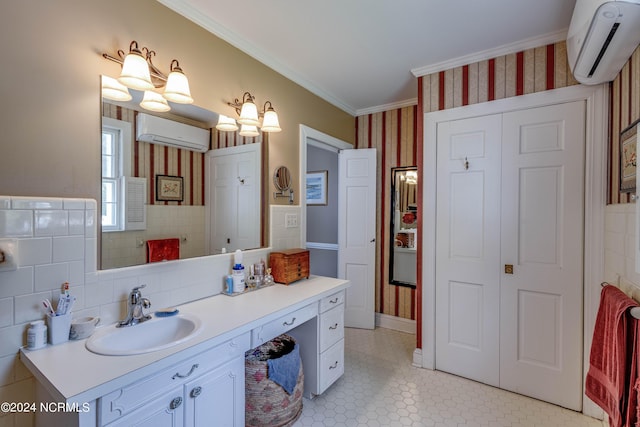 bathroom with wallpapered walls, vanity, crown molding, and a wall mounted air conditioner