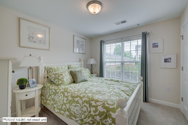 bedroom featuring carpet