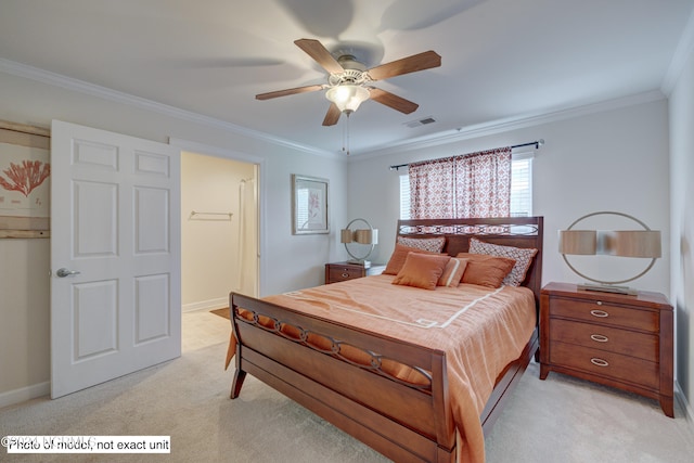 bedroom with ceiling fan, light carpet, and ornamental molding