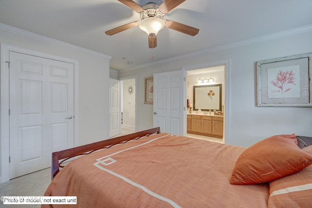 carpeted bedroom with ceiling fan, connected bathroom, and crown molding