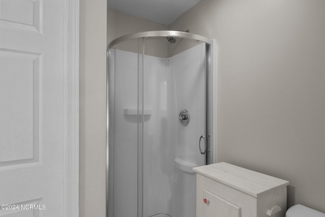 bathroom featuring walk in shower