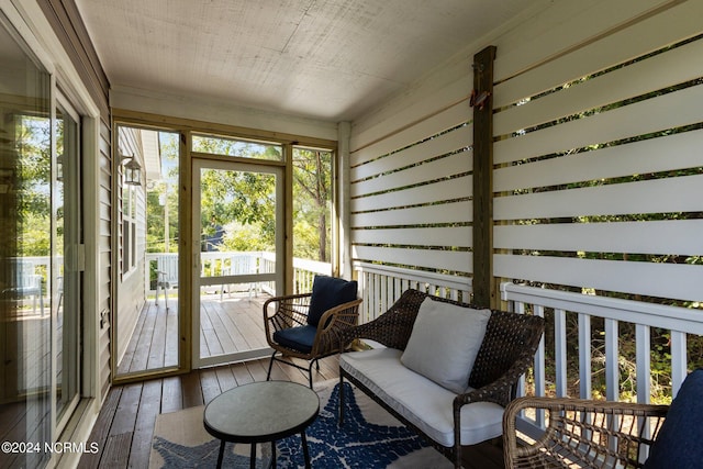 sunroom / solarium featuring a wealth of natural light