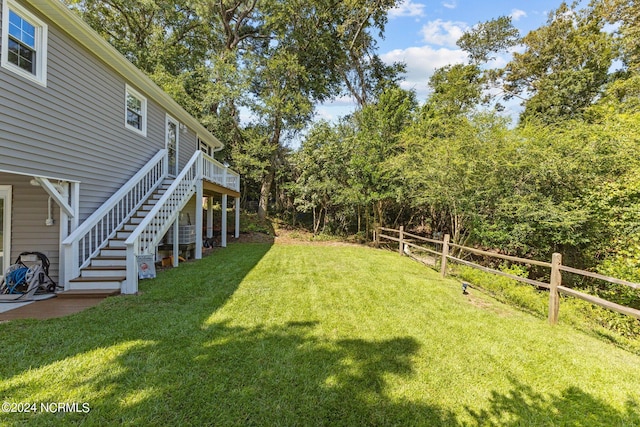 view of yard featuring a deck