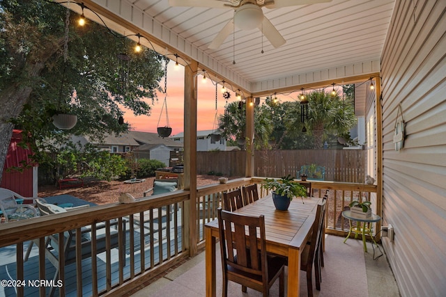 patio terrace at dusk with ceiling fan