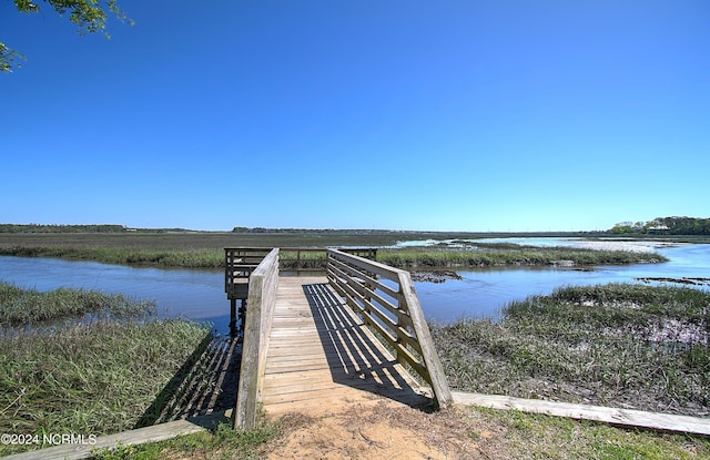 view of dock with a water view