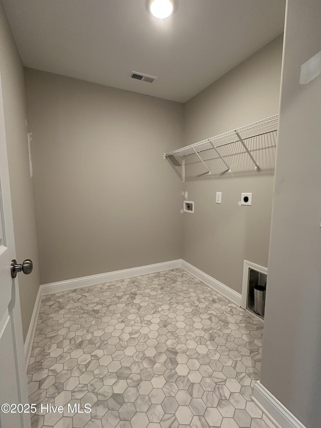 laundry area featuring electric dryer hookup and washer hookup