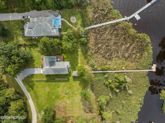 birds eye view of property featuring a water view