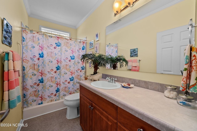 bathroom with vanity, toilet, ornamental molding, and walk in shower