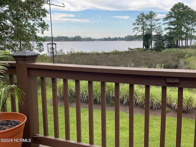 balcony featuring a water view