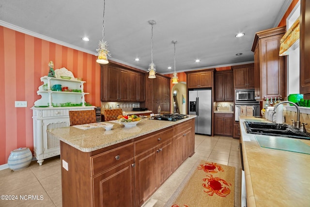 kitchen featuring decorative light fixtures, light stone countertops, stainless steel appliances, an island with sink, and light tile patterned flooring