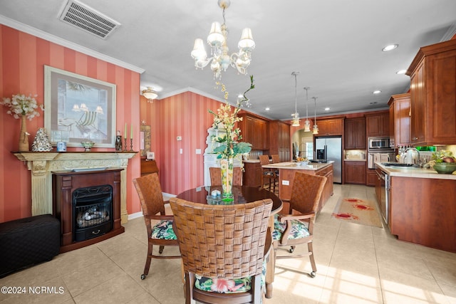 dining room with crown molding, a chandelier, and light tile patterned flooring