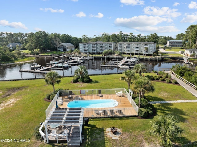 birds eye view of property with a water view