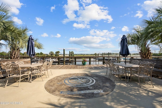 view of patio / terrace with a water view