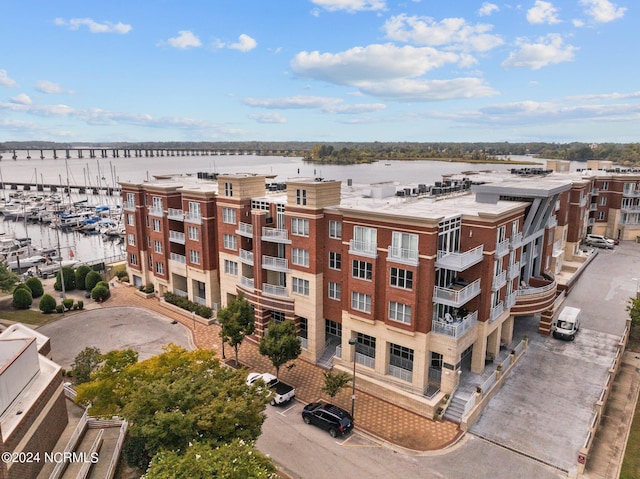 view of building exterior featuring a water view