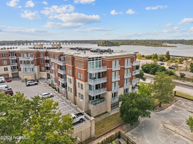 view of building exterior with a water view