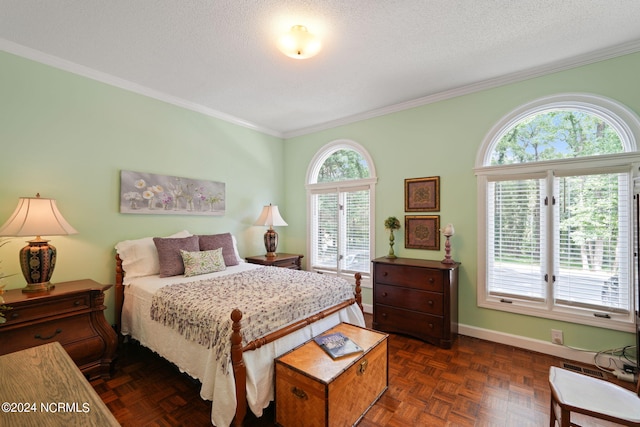 bedroom with dark parquet floors, crown molding, and a textured ceiling