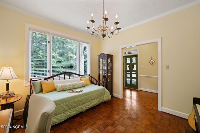 bedroom with an inviting chandelier, baseboards, a textured ceiling, and ornamental molding