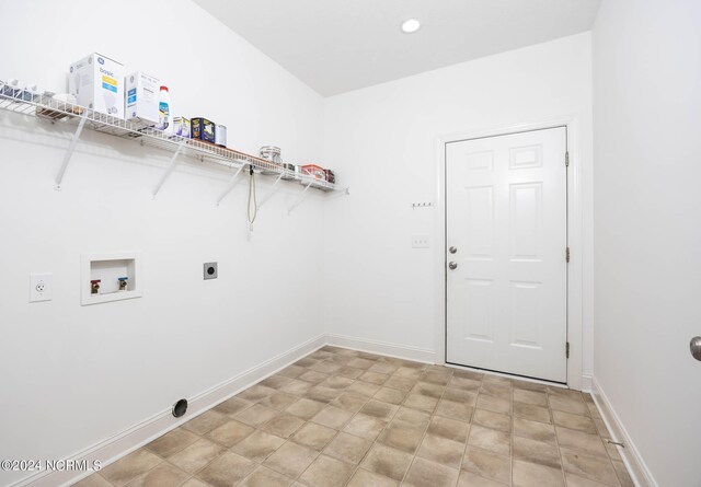 laundry area with washer hookup and electric dryer hookup