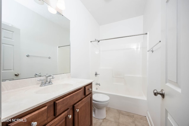 full bathroom featuring tile patterned floors, vanity, toilet, and  shower combination