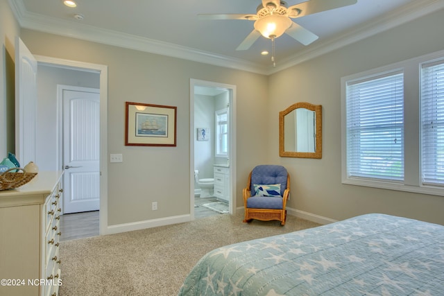 bedroom with baseboards, ornamental molding, and light colored carpet