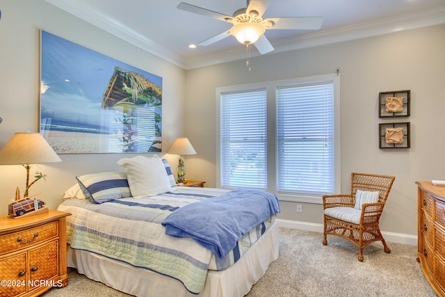 bedroom featuring baseboards, ceiling fan, ornamental molding, and light colored carpet