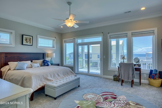 bedroom featuring light carpet, visible vents, baseboards, access to outside, and crown molding