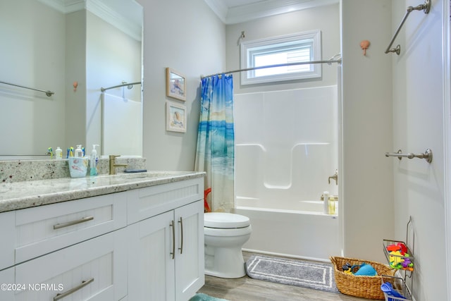 bathroom with toilet, shower / tub combo, wood finished floors, vanity, and ornamental molding