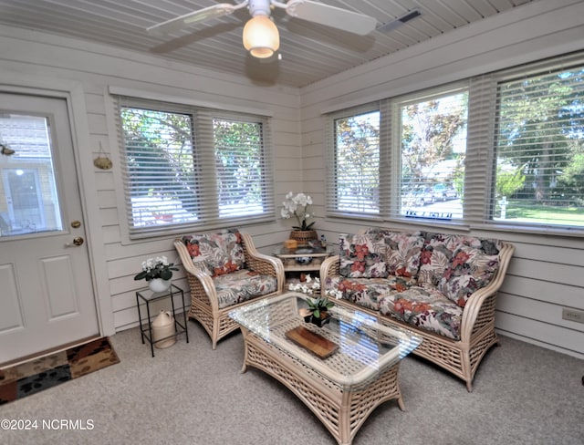 sunroom / solarium with ceiling fan