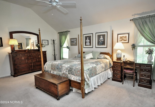 carpeted bedroom with lofted ceiling and ceiling fan