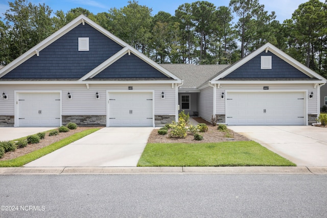 craftsman inspired home featuring a garage