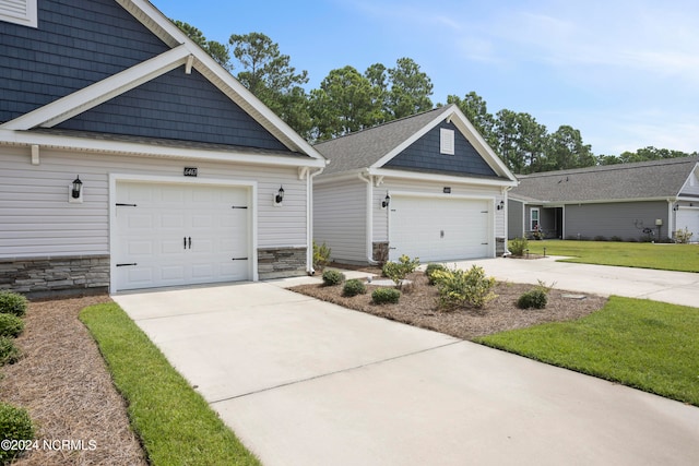 craftsman-style house featuring a garage