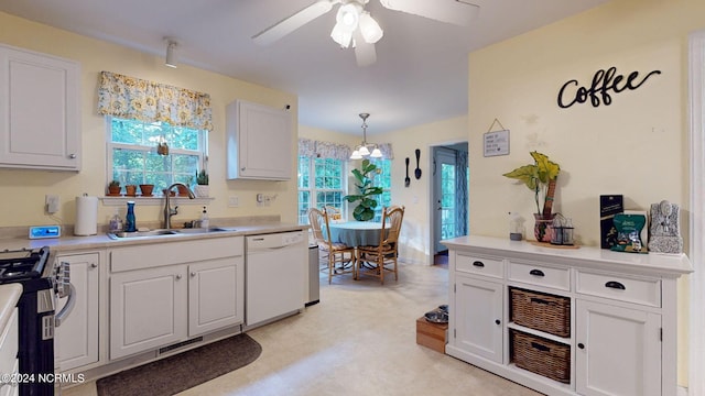 kitchen featuring dishwasher, decorative light fixtures, white cabinetry, sink, and ceiling fan