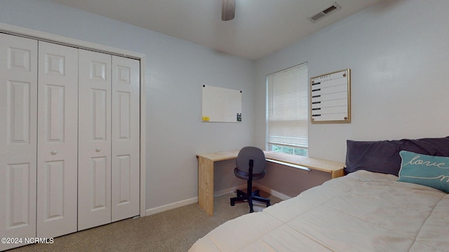 bedroom featuring a closet, ceiling fan, and carpet