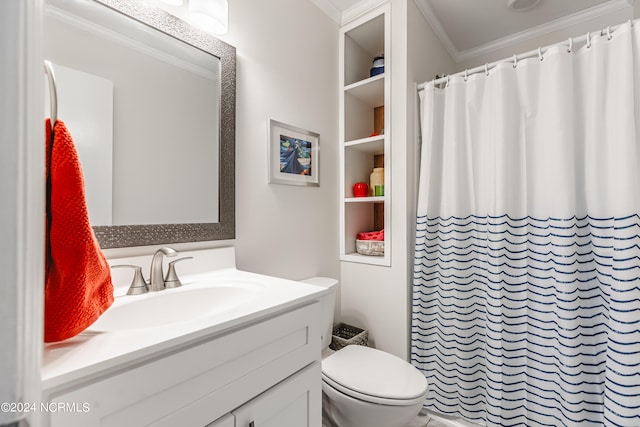 bathroom featuring ornamental molding, vanity, toilet, and curtained shower