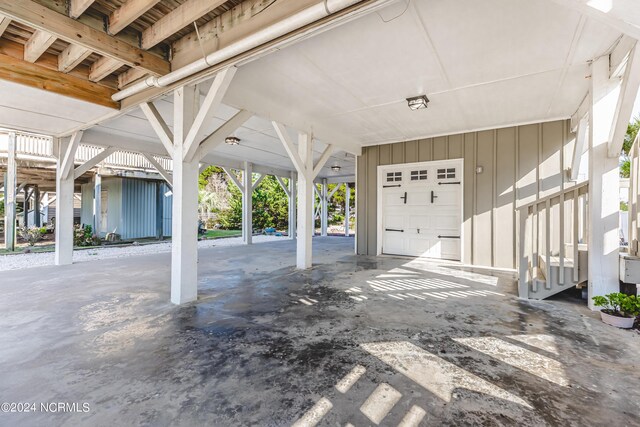 view of patio with a garage