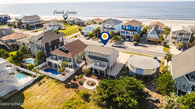 aerial view with a view of the beach and a water view