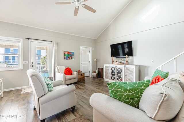 living room featuring vaulted ceiling, hardwood / wood-style floors, and ceiling fan