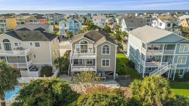 birds eye view of property with a residential view