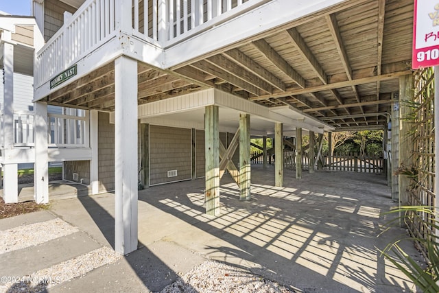 view of patio / terrace with a carport