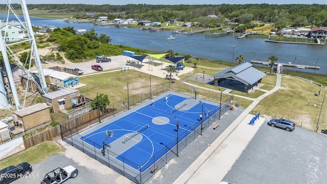 birds eye view of property with a water view