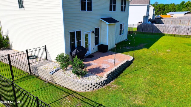 view of yard featuring a storage unit and a trampoline