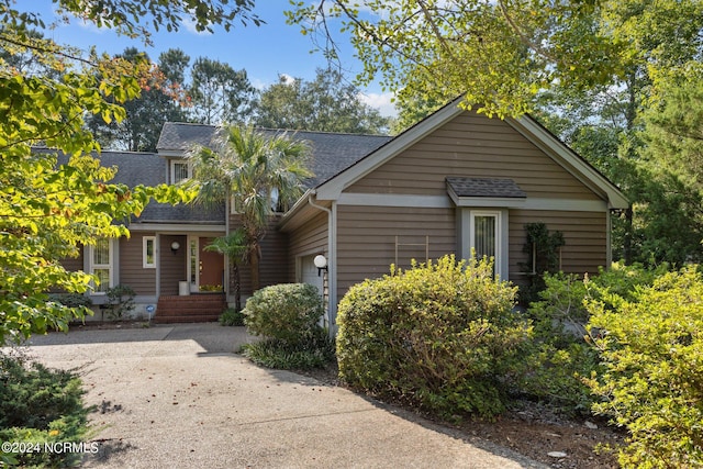 bungalow-style house with a garage