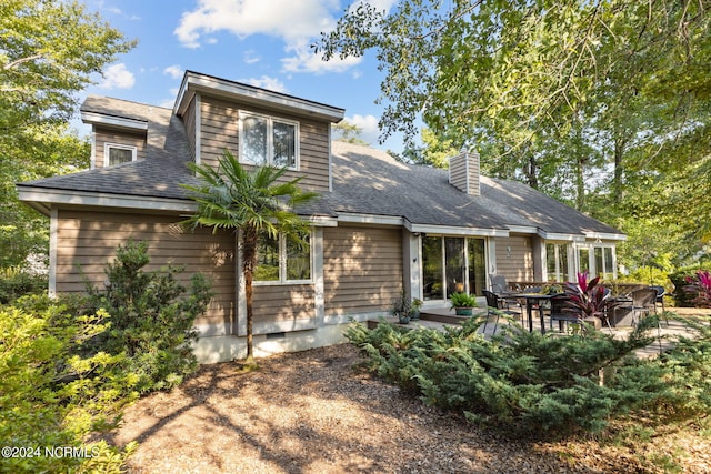 view of front of home featuring a patio