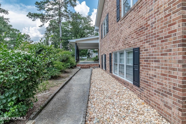 view of home's exterior featuring brick siding