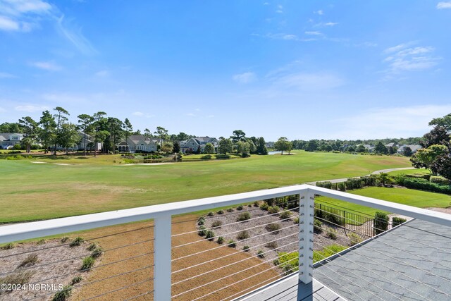 balcony featuring view of golf course