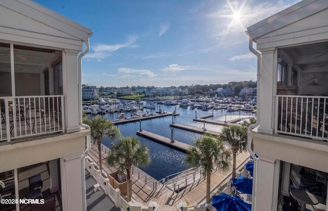 balcony featuring a water view