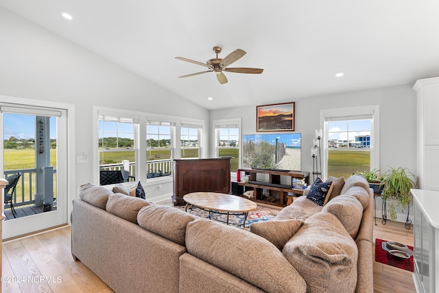 living room with vaulted ceiling, light wood-type flooring, a ceiling fan, and recessed lighting