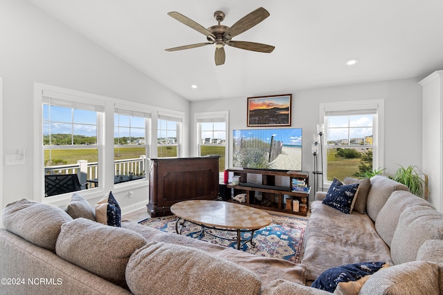 living area featuring a wealth of natural light, vaulted ceiling, recessed lighting, and ceiling fan